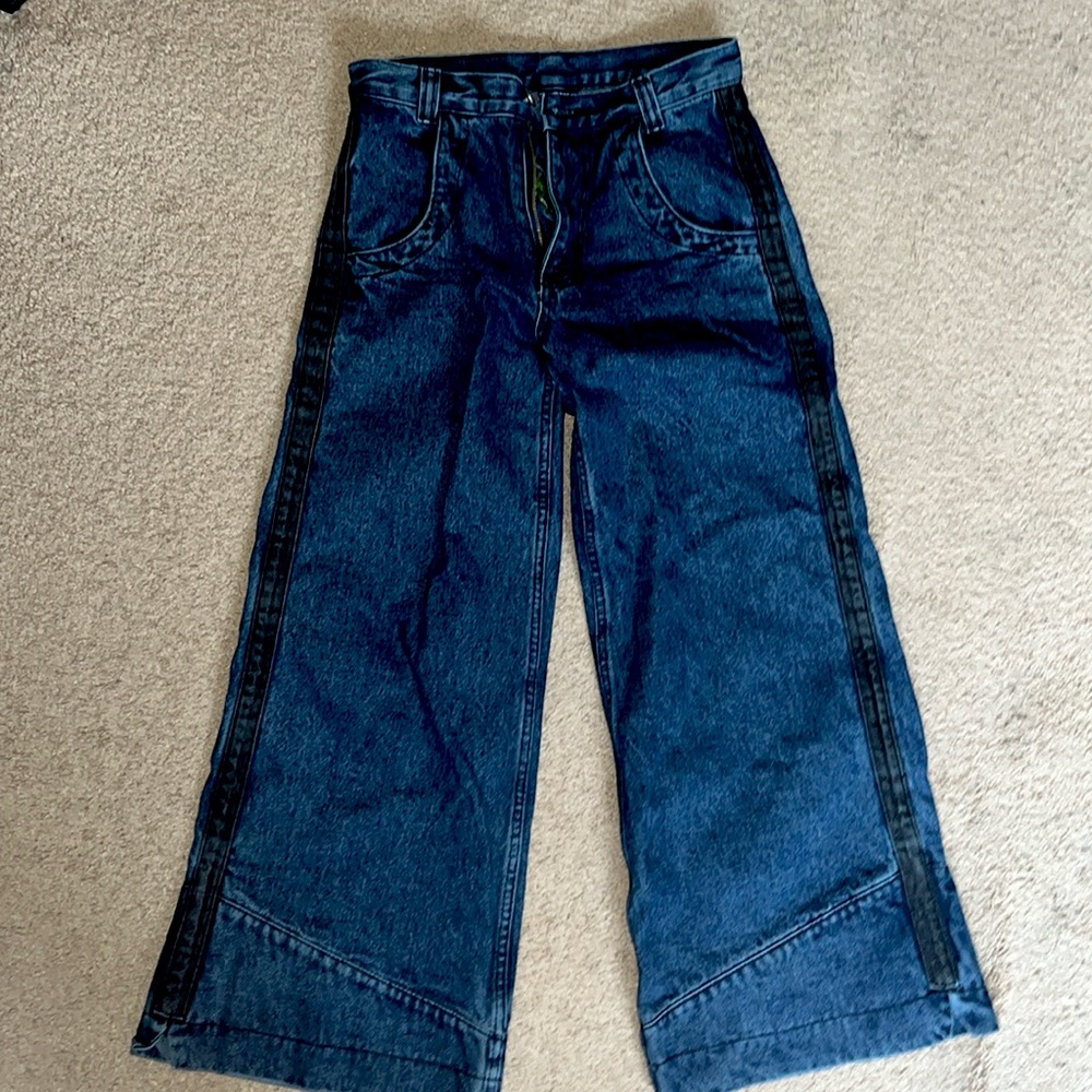 Liquid Lagoon size 26/28, Never worn. Blue divider Denim